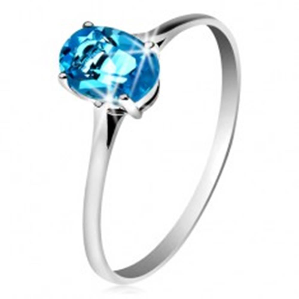 Šperky eshop Zlatý prsteň 585 s oválnym ligotavým topásom modrej farby, tenké ramená - Veľkosť: 49 mm