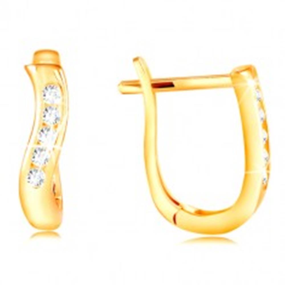 Šperky eshop Zlaté náušnice 585 - lesklá zvislá vlnka zo žltého zlata, pás čírych zirkónov